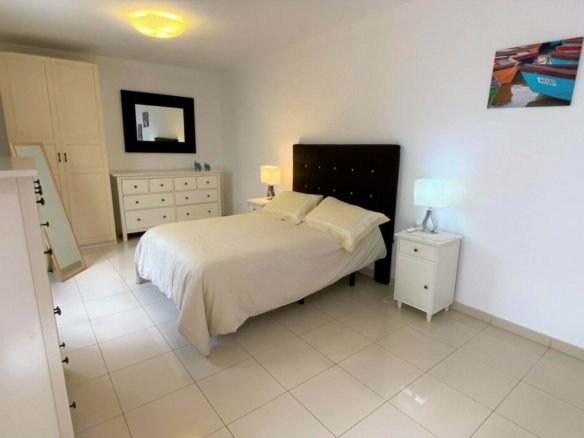 Tiempo - Downstairs Master Bedroom